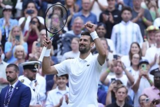 Une belle 100e pour Novak Djokovic. KEYSTONE/AP/Kirsty Wigglesworth